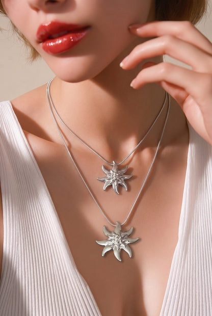 Ensemble collier, bracelet et boucles d'oreilles, blanc